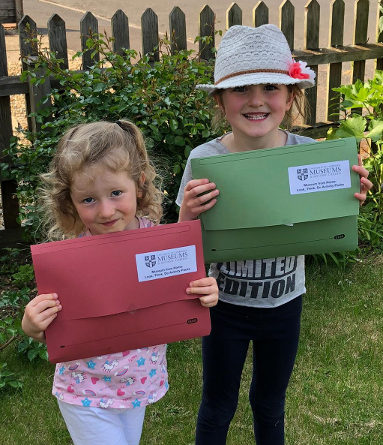 Cambridge children receiving their creative packs
